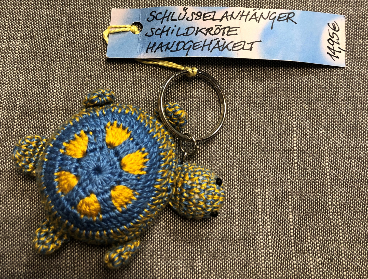 SLOW Schildkröte Schlüsselanhänger handgehäkelt, orange-grün