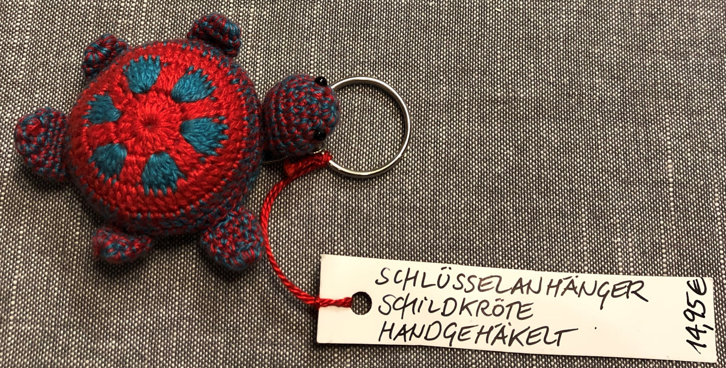 SLOW Schildkröte Schlüsselanhänger handgehäkelt, orange-grün